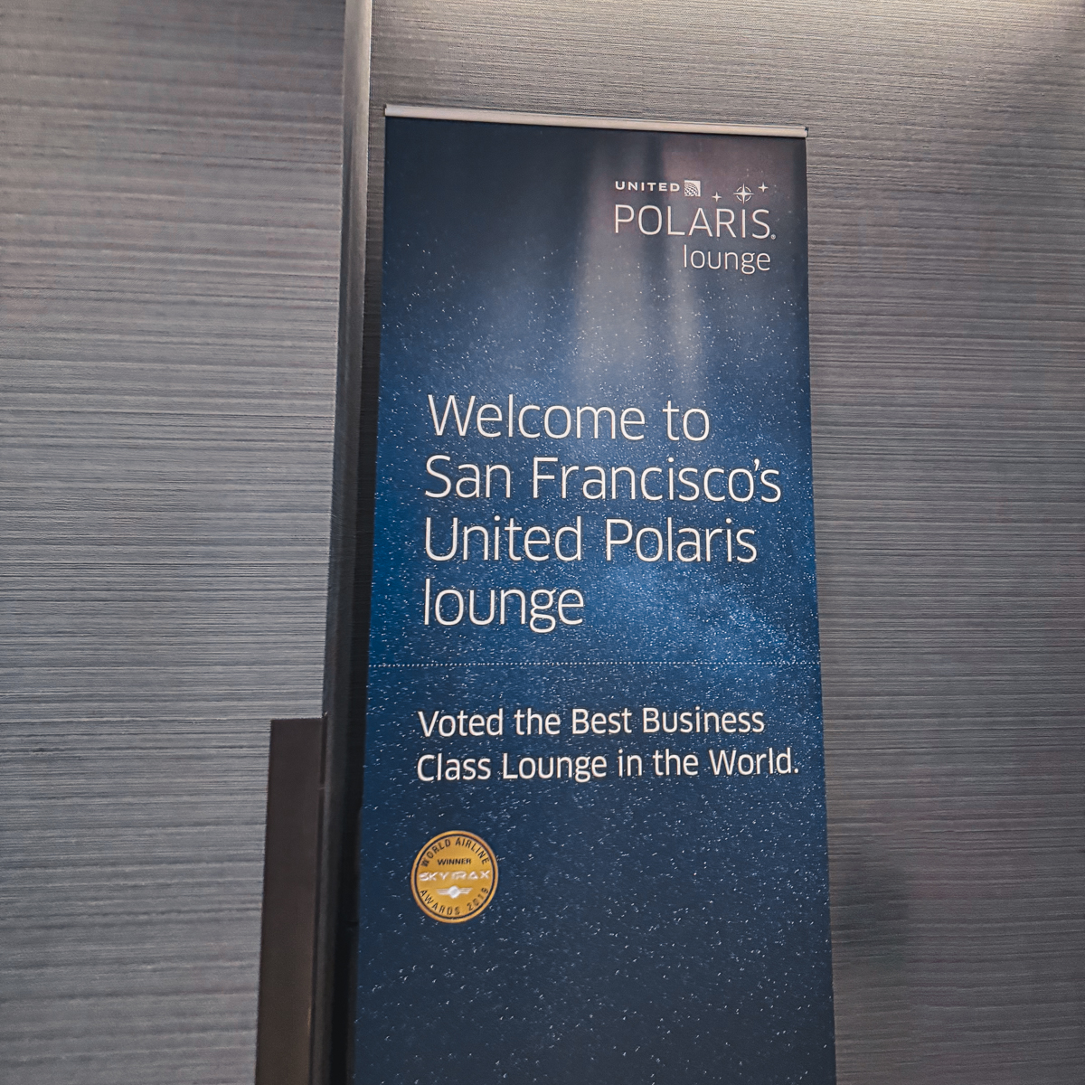 SFO Polaris Lounge welcome banner.