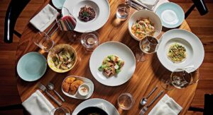 A Dining Table With Food. 