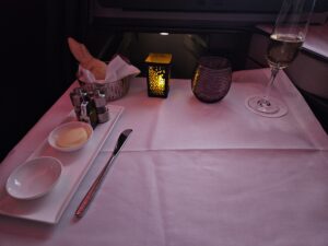 qatar airways bread dinner beverage