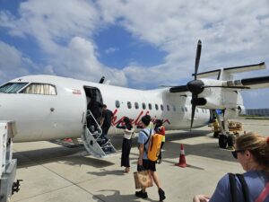 boarding our flight plane male international airport domestic transfer