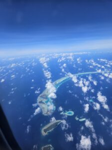 maldivian airlines atoll view flight in air picture