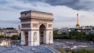 Arc de Triomphe And Eiffel Tower In Paris.