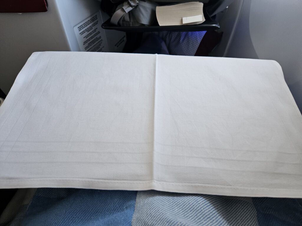 tray table covered business class austrian airlines