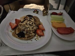 virgin atlantic business class upper class breakfast pancakes fruit nutella