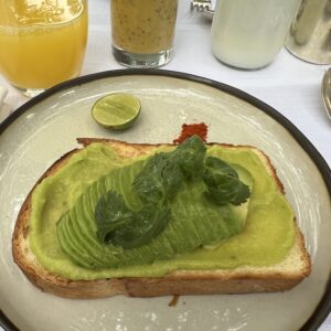 Park Hyatt Bangkok Breakfast Avocado Toast, Orange Juice, And Tropical Smoothie