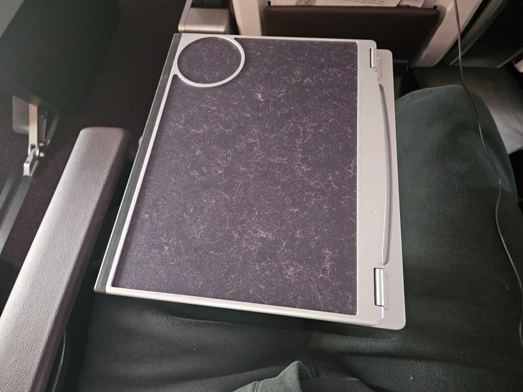 tray table virgin atlantic a330 premium economy halfway open